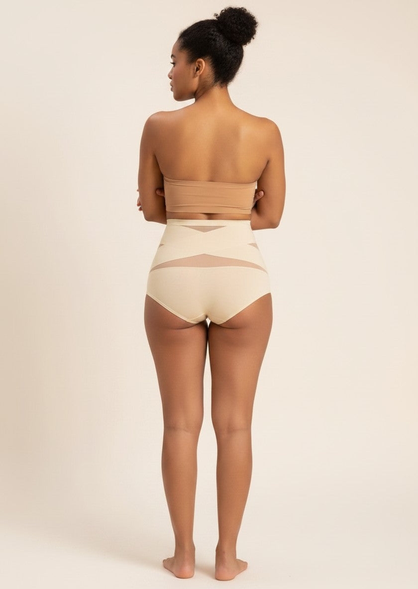 YACO CurveFit beige high-waisted shaping bottoms with breathable mesh panels worn by a model from the back view