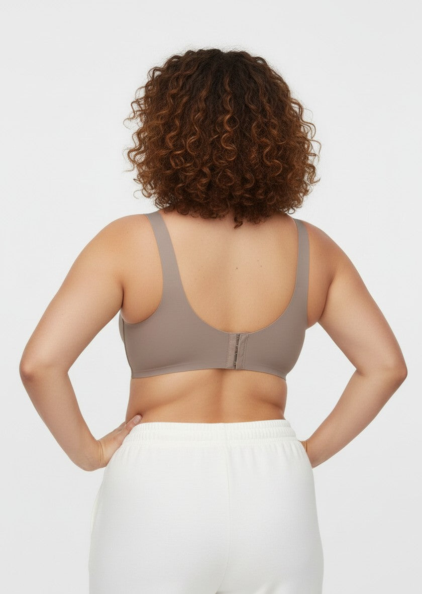 YACO Jelly push up bra in taupe, featuring a seamless wire-free back design on a woman with curly hair.